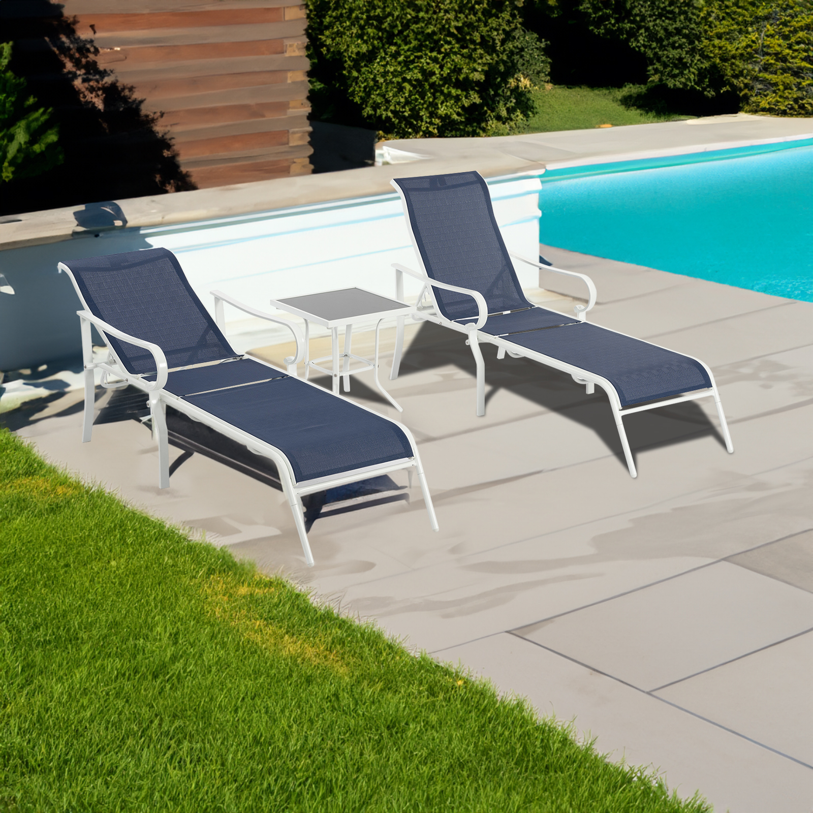 Navy loungers reclined beside a glass table on a sunlit stone patio