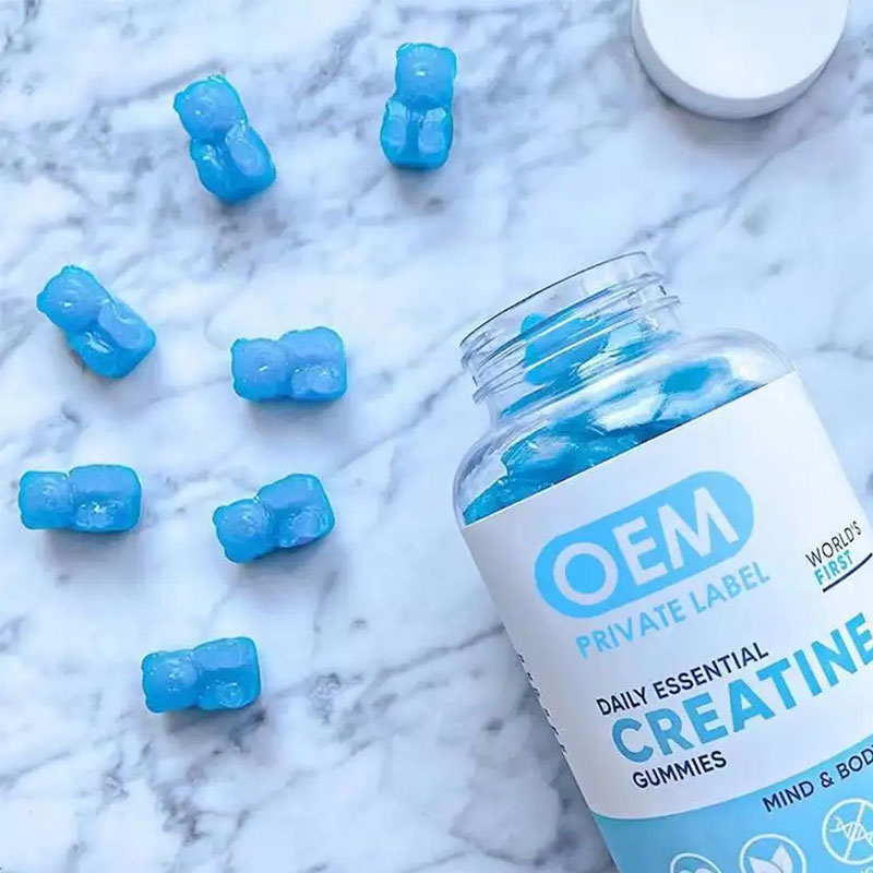 Macro shot of a single translucent turquoise creatine gummy, showing chewy texture and delicious appearance