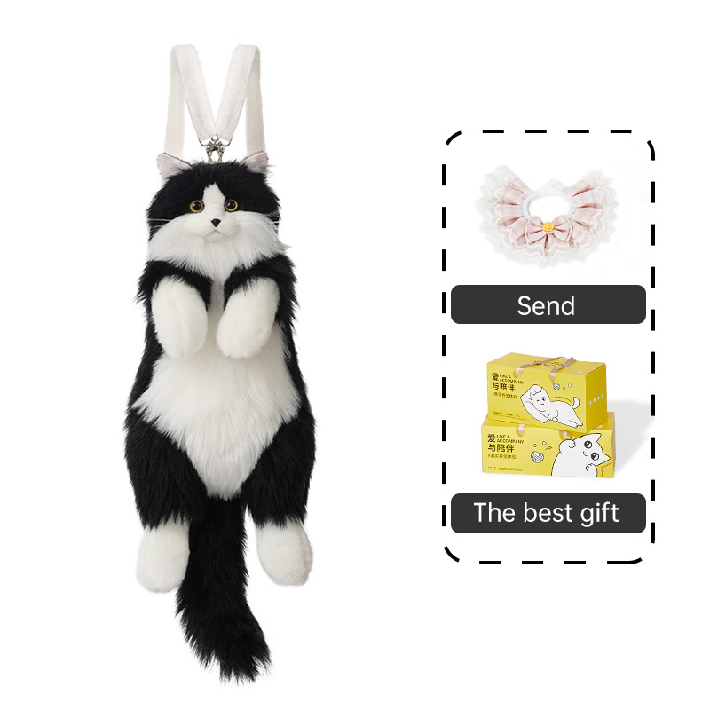 Plain tote bag hanging by the door beside a soft plush cat