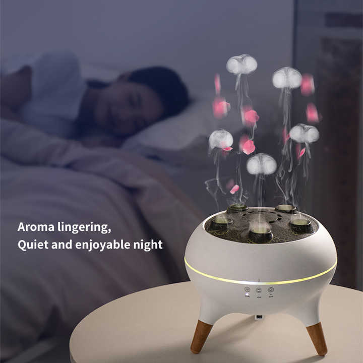Jellyfish aroma diffuser glowing on a bedside table in a bedroom