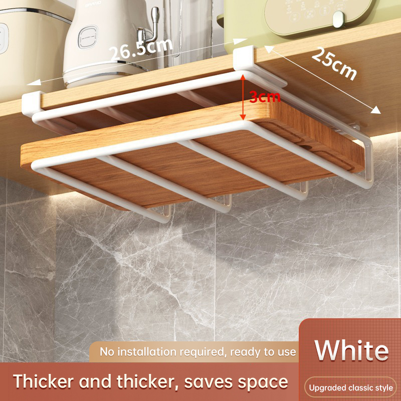 White rack close-up showing rails, hooks on the cabinet edge and board tiers