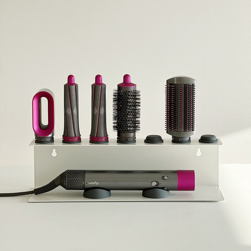 White wall rack with full attachment lineup on the top shelf