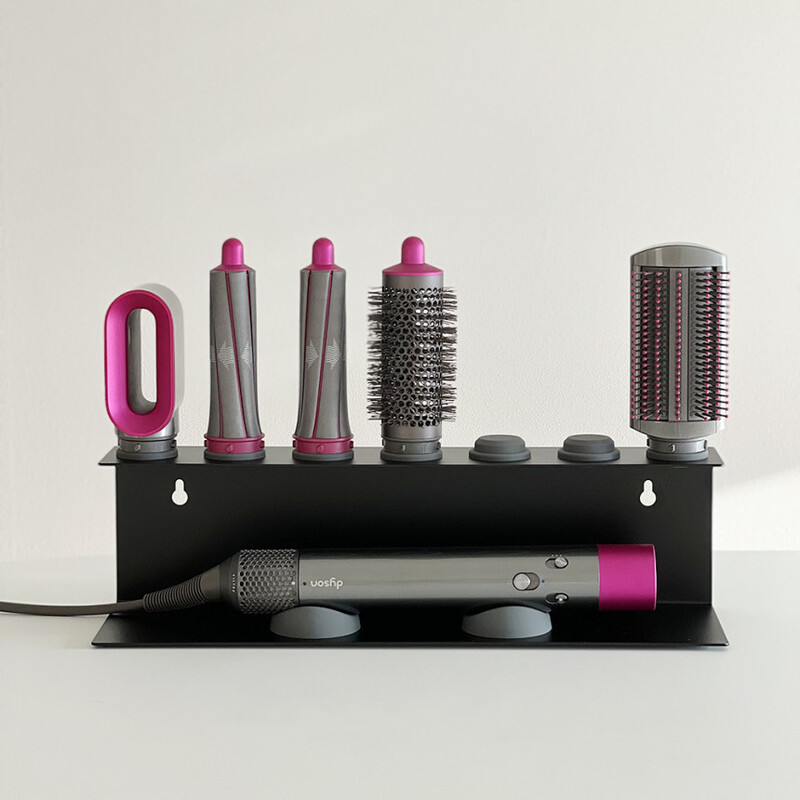 Black rack with six open attachment slots and a dryer cradle