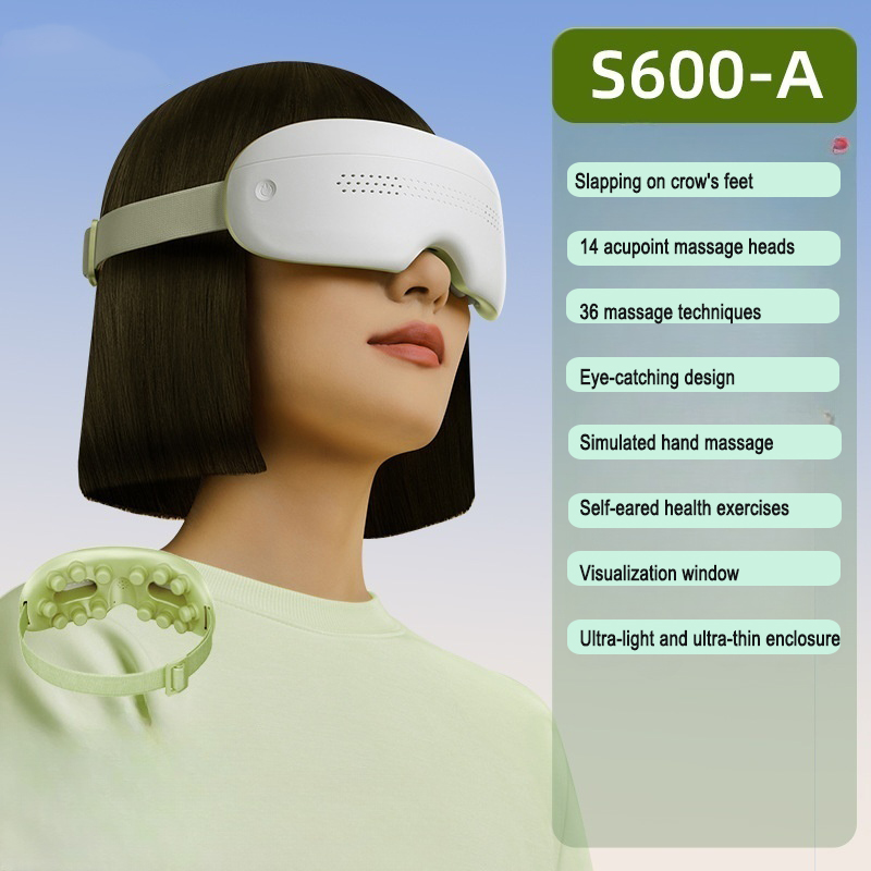 White eye massager with green headband worn by model, showing thin profile