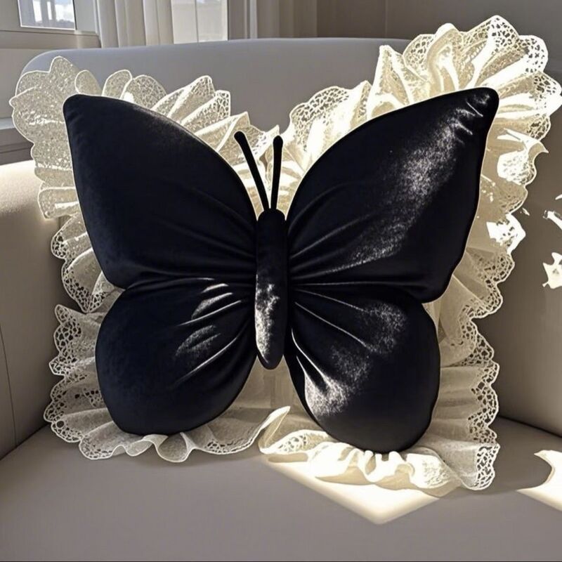 Midnight black velvet butterfly pillow with cream lace ruffle