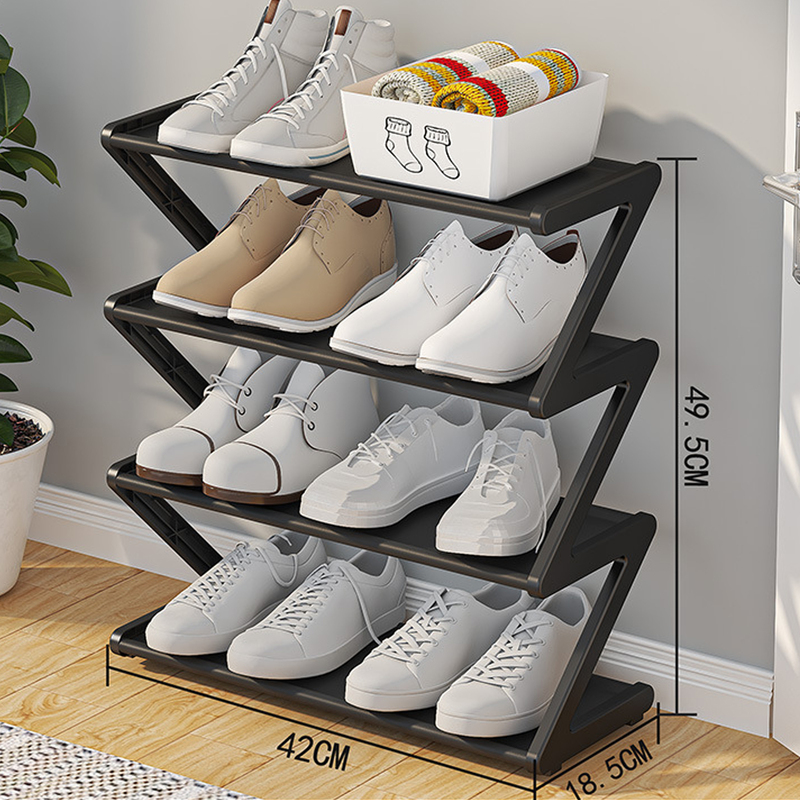 Side angle of black Z-shaped shoe rack with shoes on each shelf