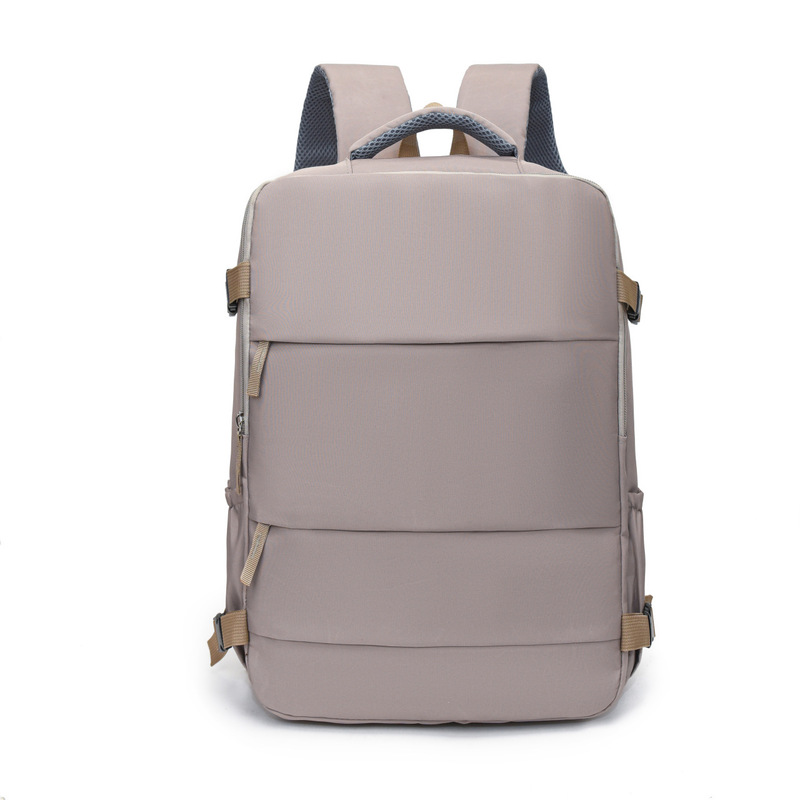 Taupe travel backpack front view with front zip pockets and contrast strap trim