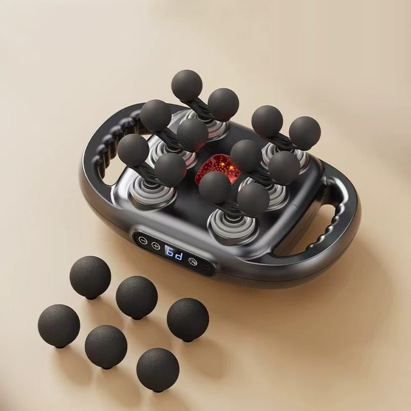 Black 12-head massage gun with seven spare massage balls in front