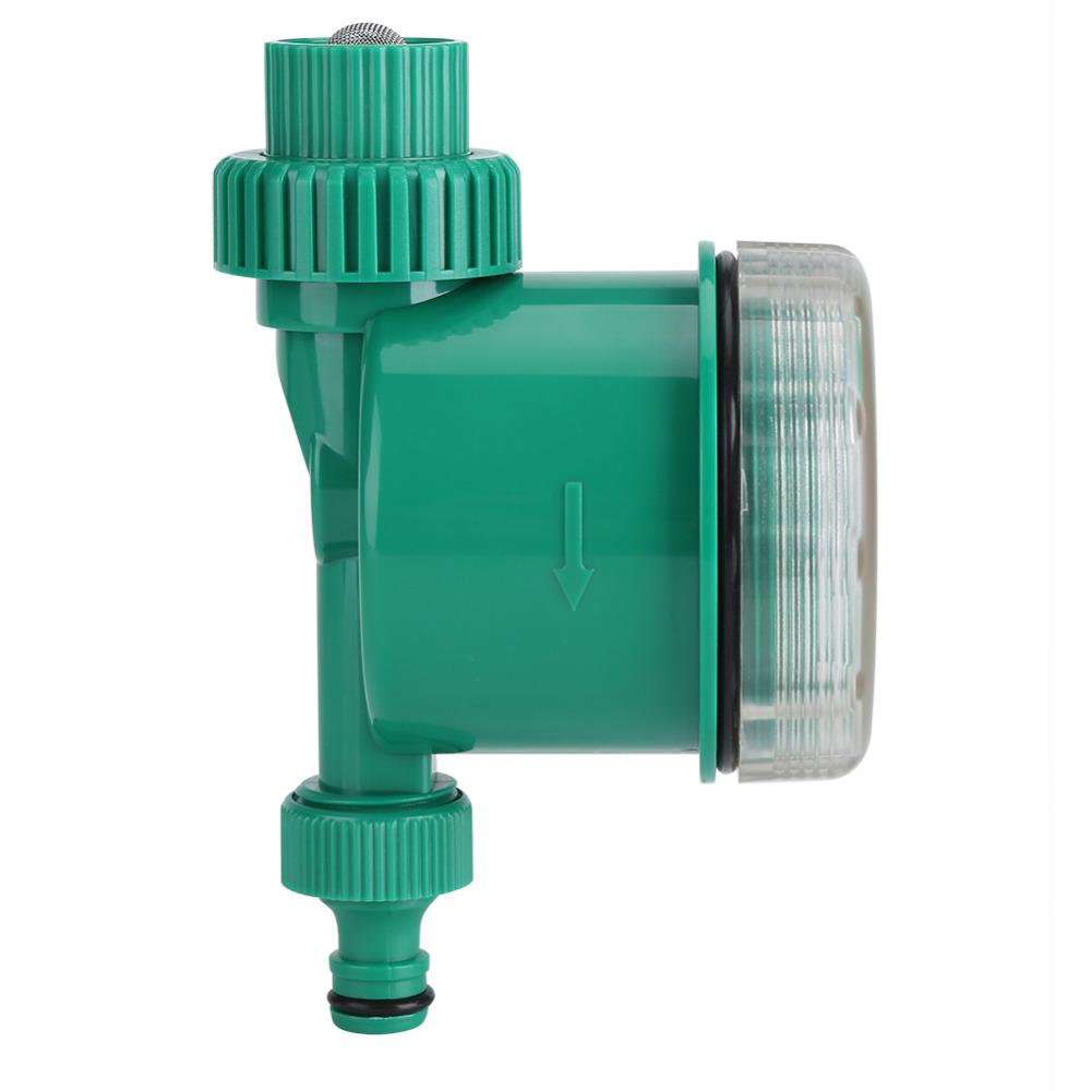Side view of timer showing flow arrow and inlet mesh filter