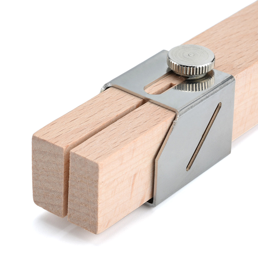Close-up of beech wood guide slot and stainless steel cutting plate