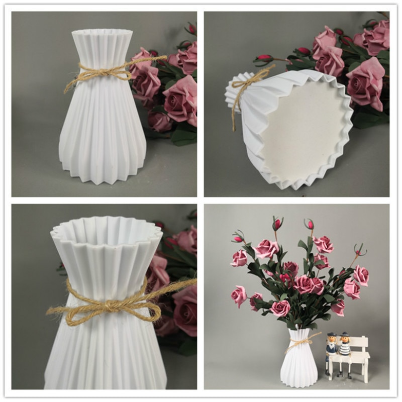 Close view of a white pleated plastic vase with its open mouth and twine