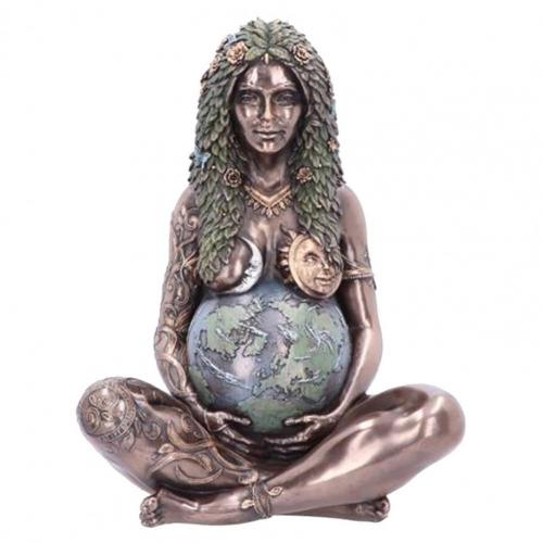 Bronze Earth Mother set at the center of a shelf