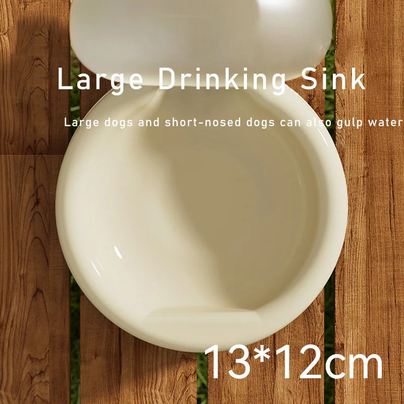 Top-down view of the cream drinking bowl on wood planks, 13 by 12 centimeters