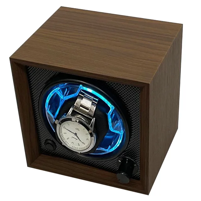 Walnut watch winder with its blue LED ring lit