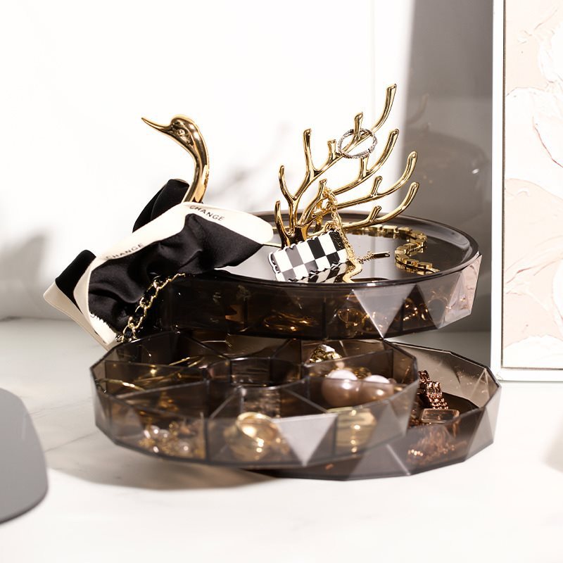 Swan jewelry box with gold neck handle and stacked smoky acrylic tiers