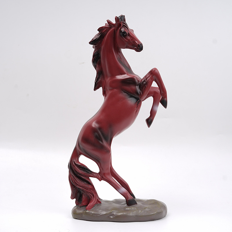 Close view of a hand-painted resin horse with weathered highlights