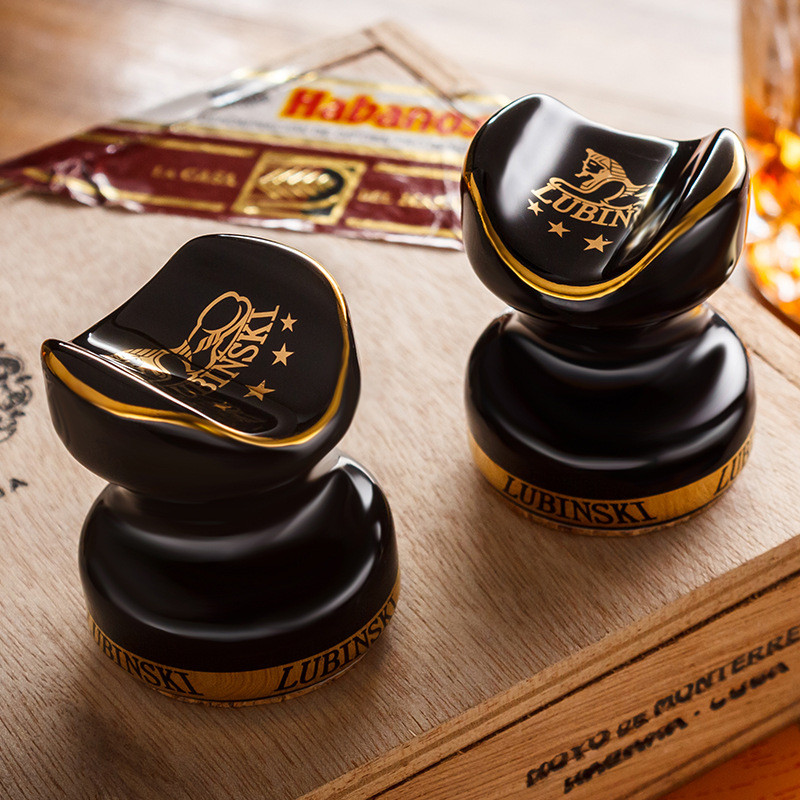 Gold line rim and logo print on black ceramic cigar holder