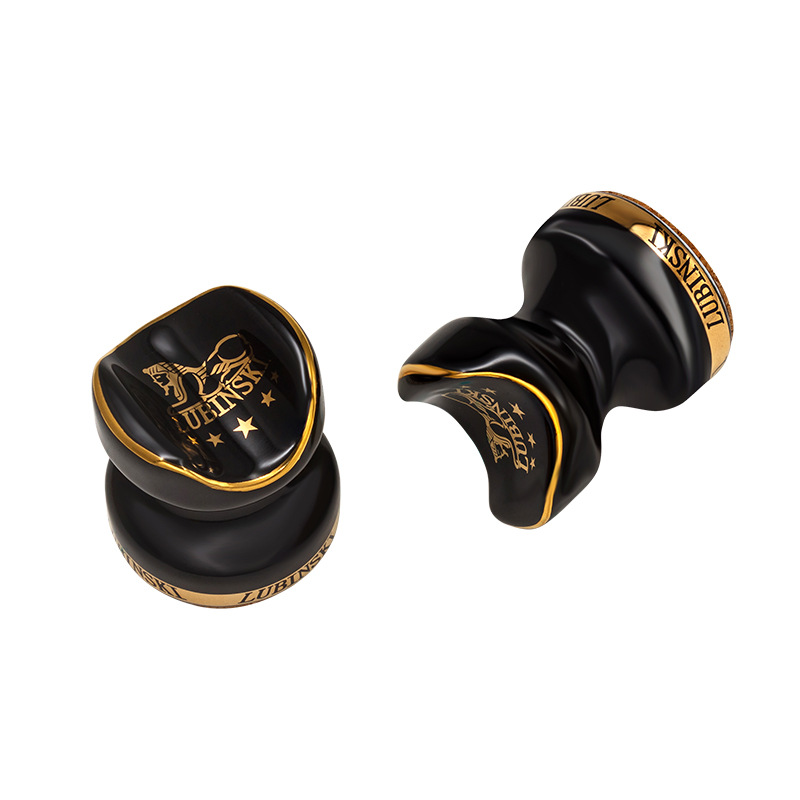 Black ceramic holder with a cigar set in its grooved cradle