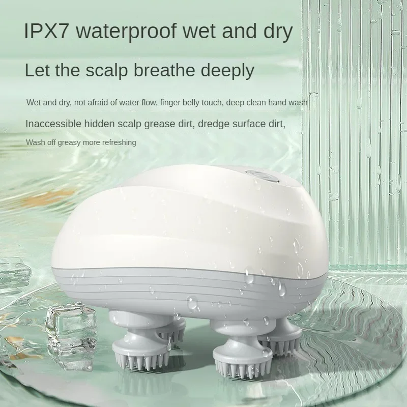White scalp massager splashed with water on a wet green surface, IPX7 rated