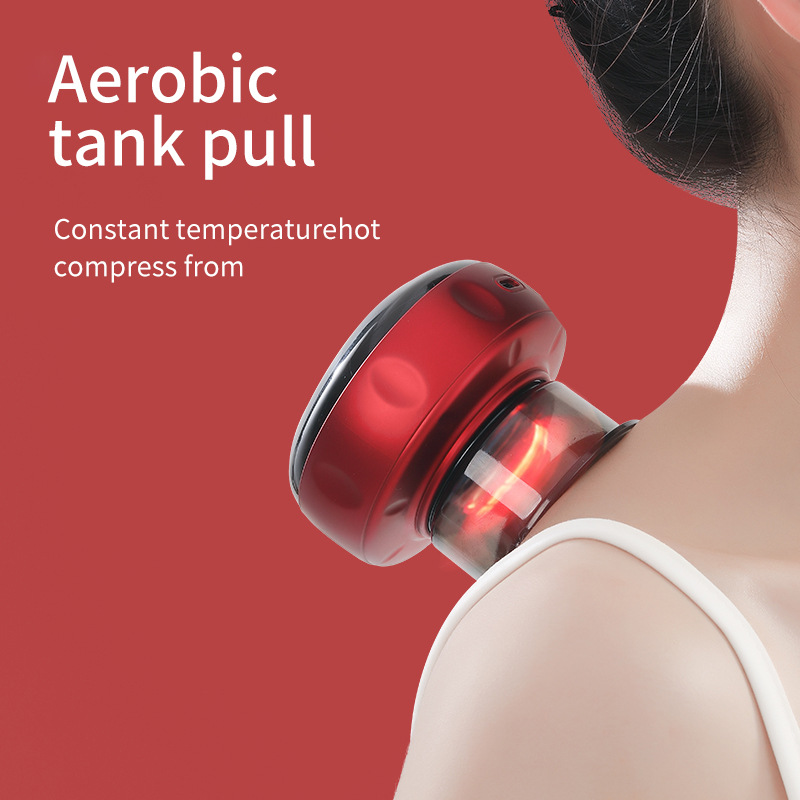 Cupping device seated on the upper shoulder with a warm red glow