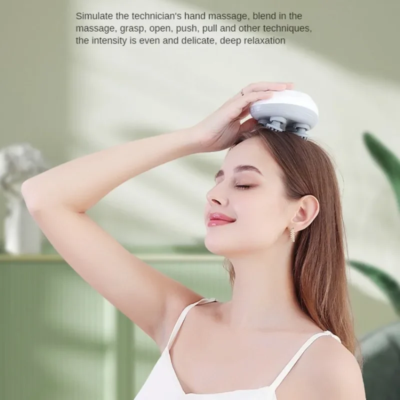 Woman with eyes closed holding a white scalp massager during a relaxing head massage