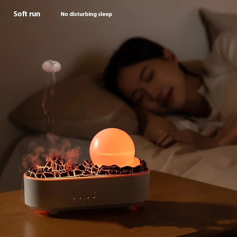 Humidifier glowing on a wooden nightstand beside a sleeping woman