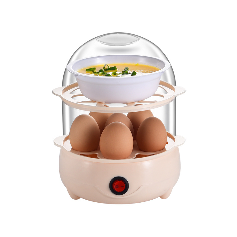 Egg cooker base with clear dome and red power switch on a clean background