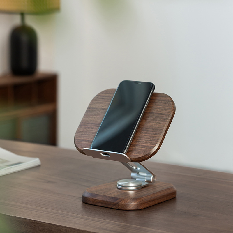 Walnut stand with smartphone tilted back at a relaxed viewing angle