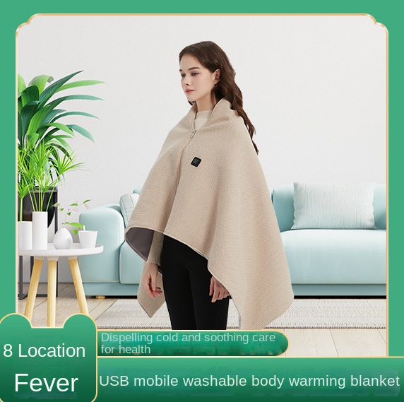Model wearing beige heated shawl draped over shoulders with zip front