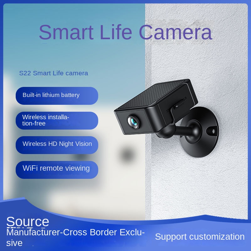 Wall-mounted black camera in a real room, showing the feature list