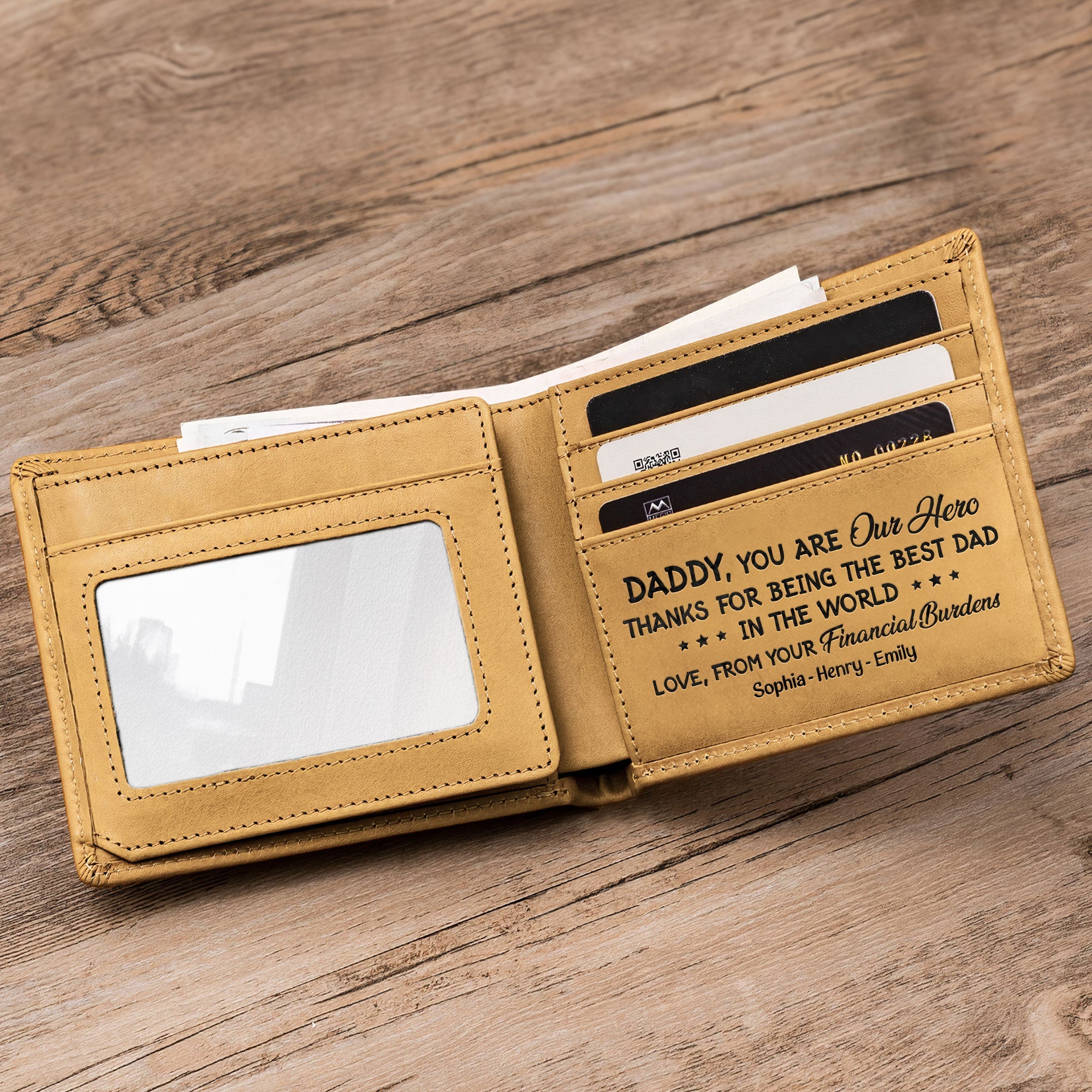 Open personalized Best Dad Ever leather wallet with card slots and a clear ID window, showcasing the engraved message.