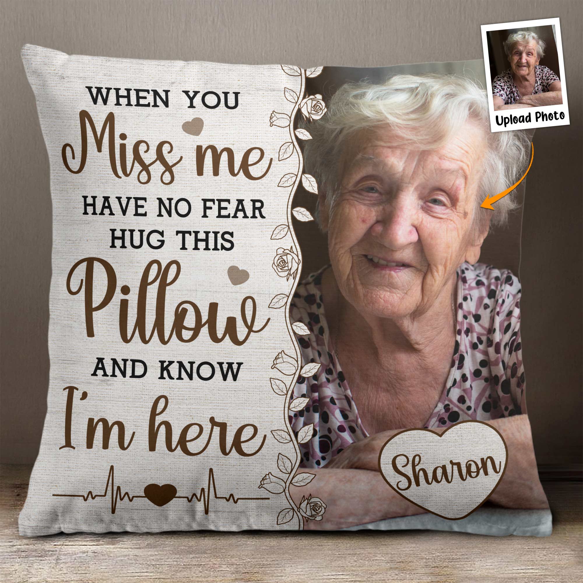 Memorial pillow with photo and text: Hug this pillow and know I'm here. Lady holding a heart.