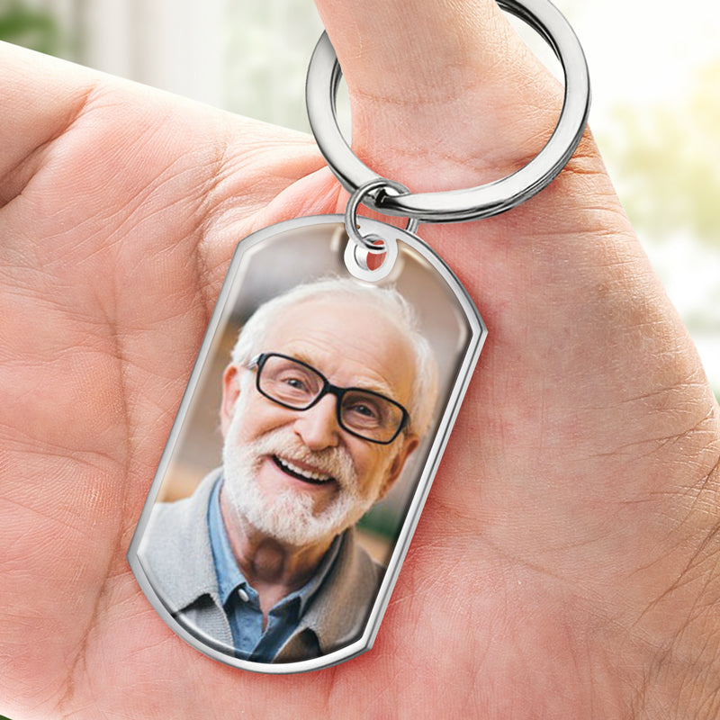 Custom photo memorial keychain with engraved image of loved one, stainless steel sympathy gift.